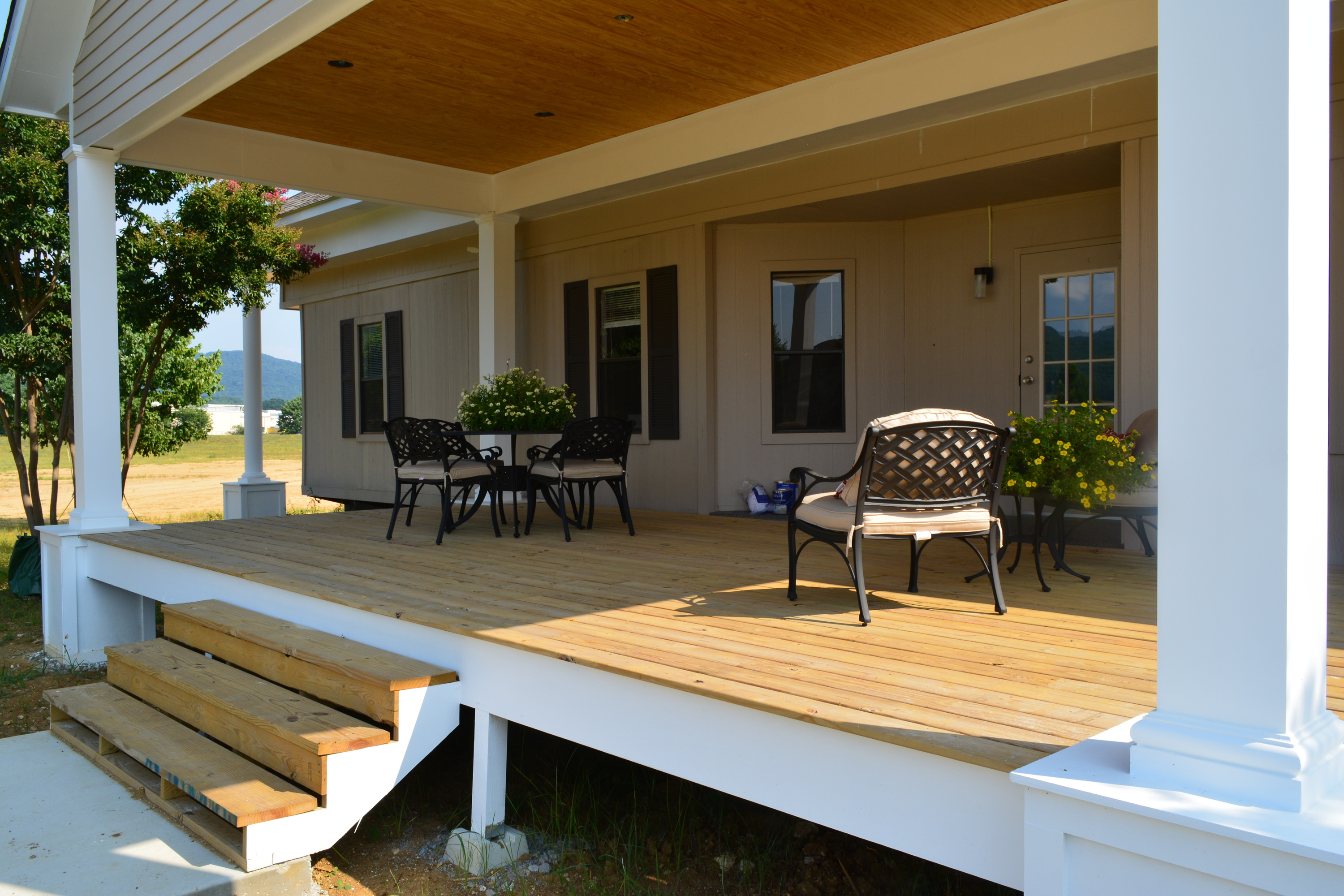 Come rest your feet on our Welcome Center's new Front Porch