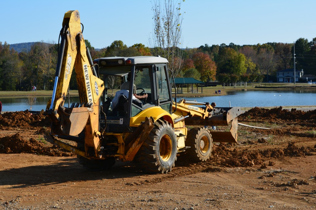 11. A Backhoe readies the ground for another new LENDON Home, while enjoying a beautiful view of Jones Farm Park. _0806