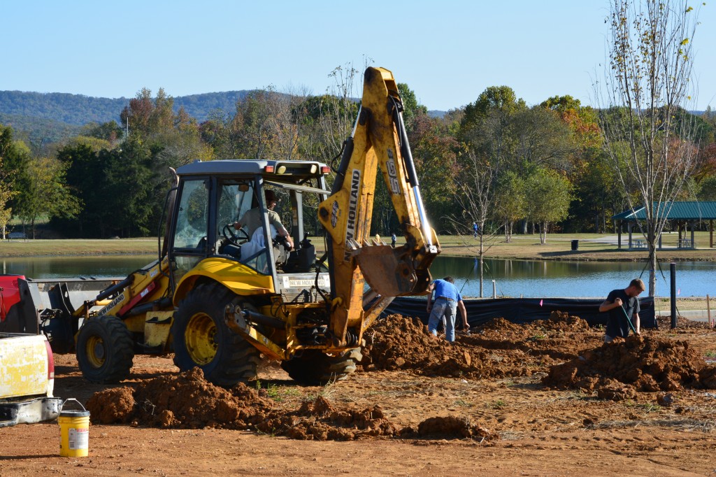 13. A crew preps a newly dug foundation near Jones Farm Park ._0803